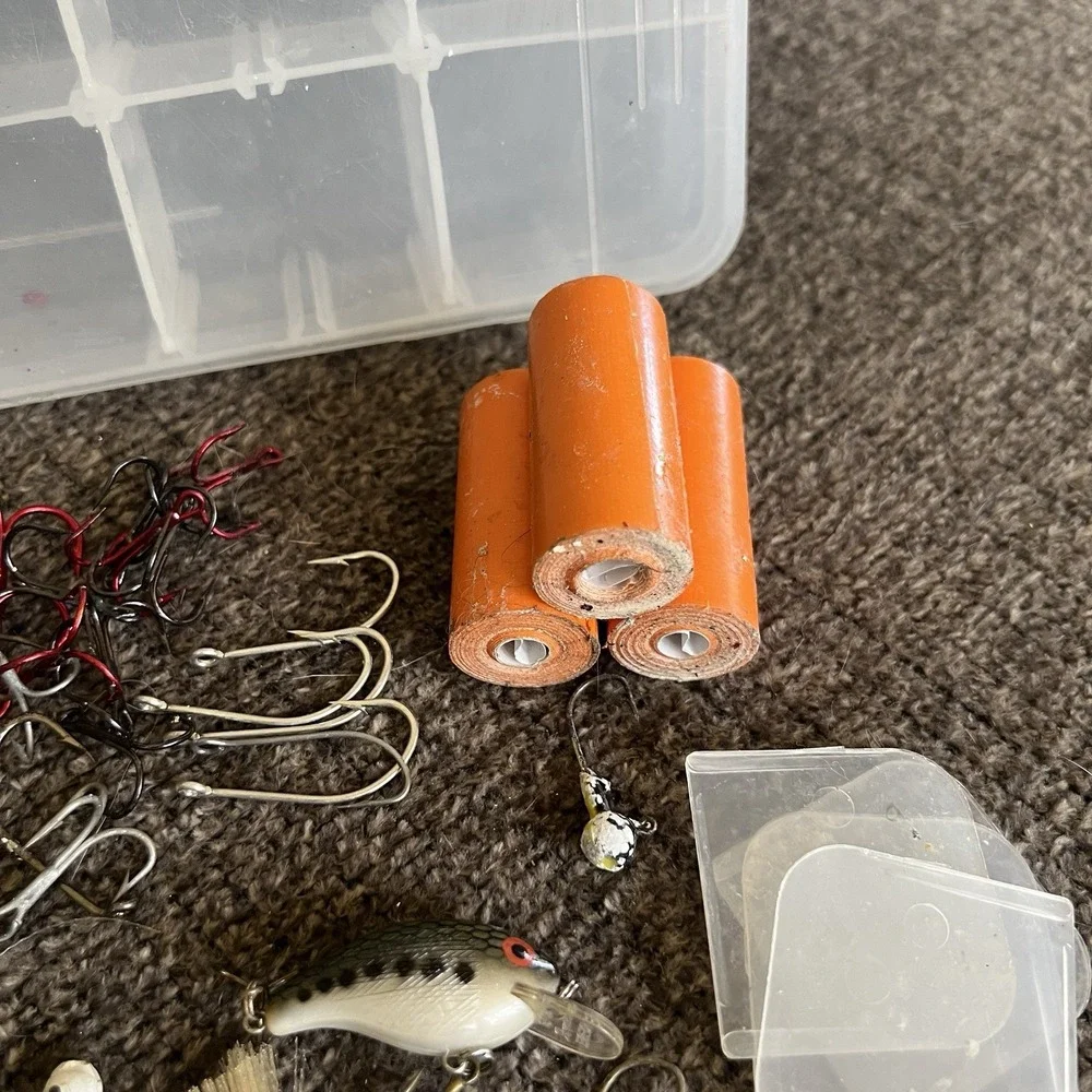 Plano Tackle Box Lot with Rebel Lure Bucktail Jigs Hooks Swivels and Hand Reel